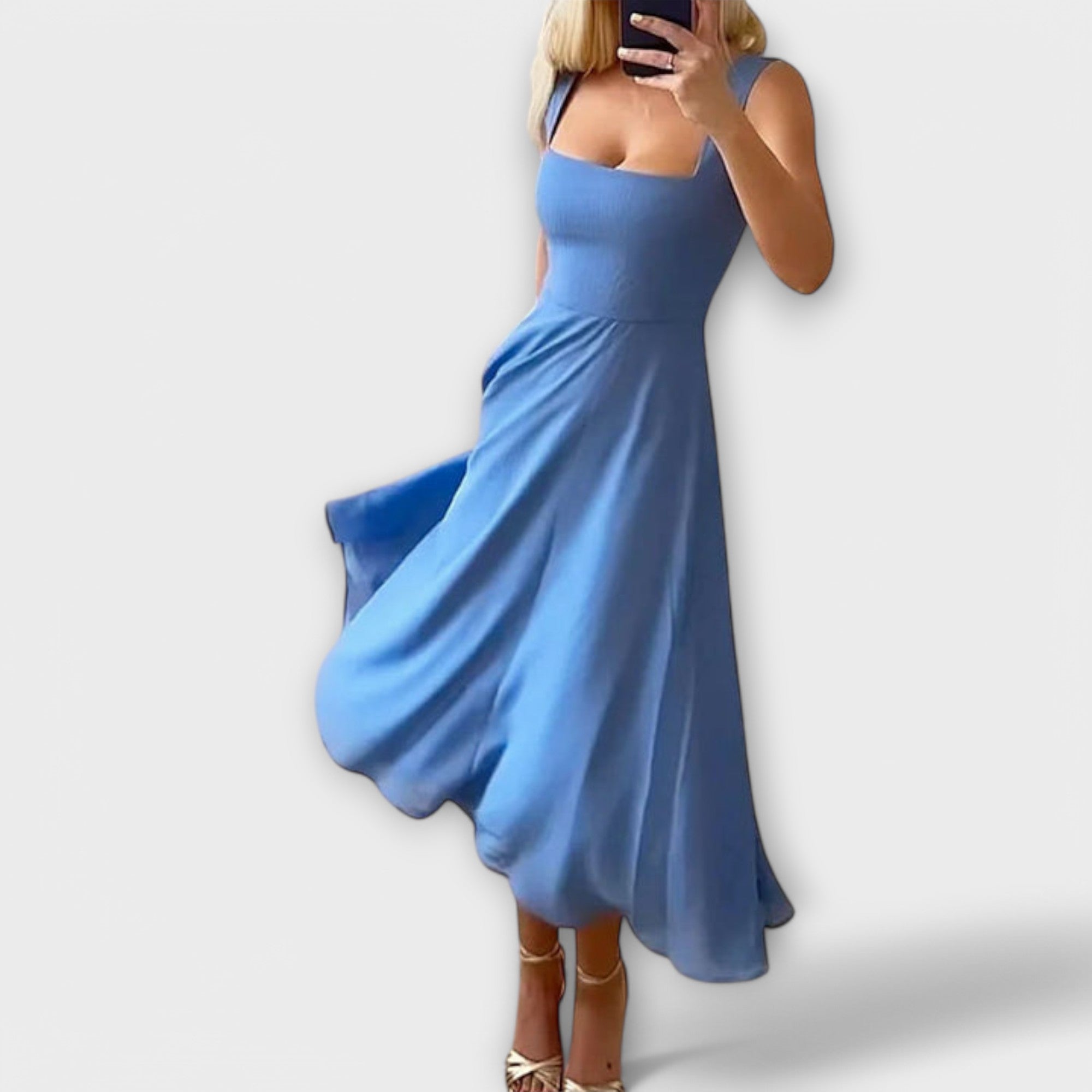 Elegant ärmlös klänning