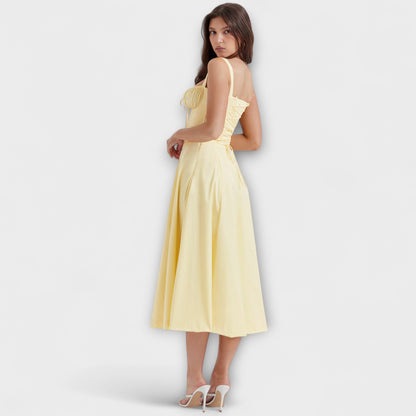 Zipporas - Figursydd bustierklänning med modern blommig tryck